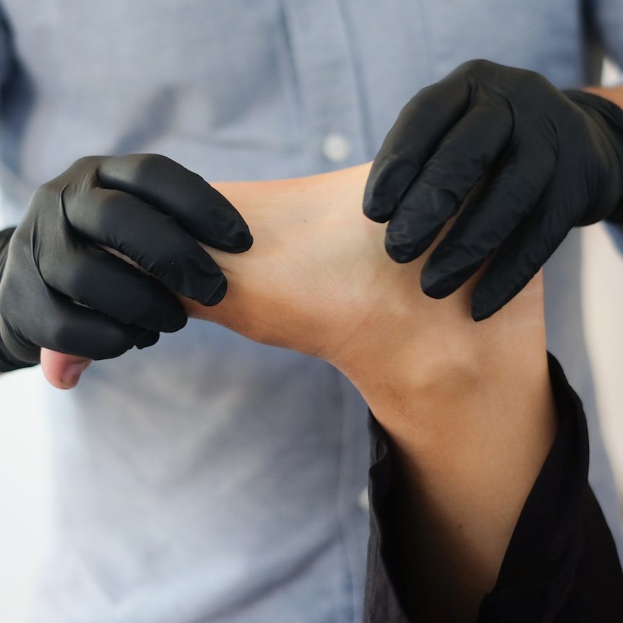 Podiatrist examining a patient's foot and ankle during an exam
